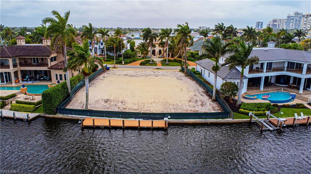 341 Devils Bight Naples, FL 34103 - Photo 6 of 16 an aerial view of a house with a yard