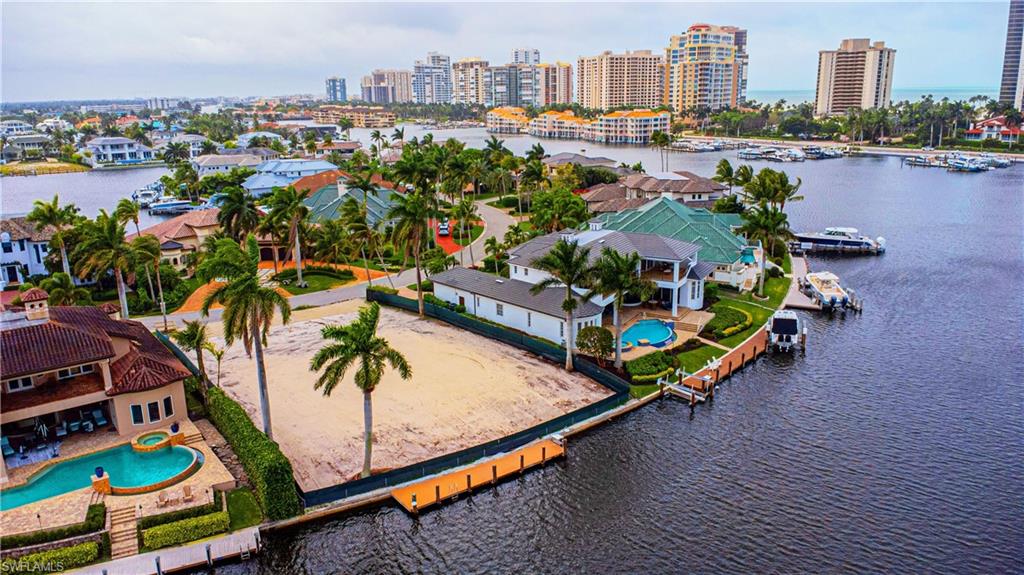 341 Devils Bight Naples, FL 34103 - Photo 7 of 16 an aerial view of a city