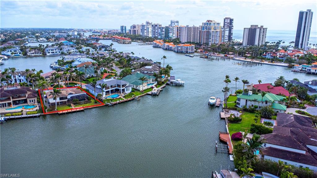 341 Devils Bight Naples, FL 34103 - Photo 9 of 16 an aerial view of a city
