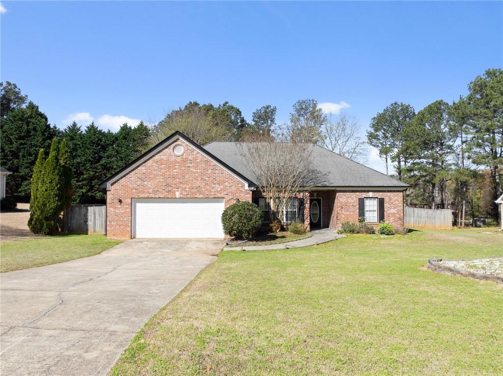 716 Michael Drive Winder, GA 30680 - Photo 2 of 46 a house view with a outdoor space