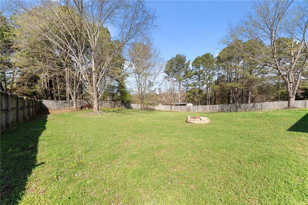 716 Michael Drive Winder, GA 30680 - Photo 33 of 46 a view of a park with large trees