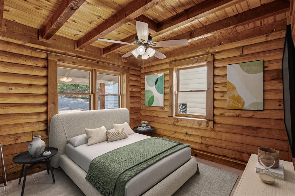 7329 Hickey Road Azle, TX 76020 - Photo 11 of 28 a bedroom with a bed a dresser next to a window