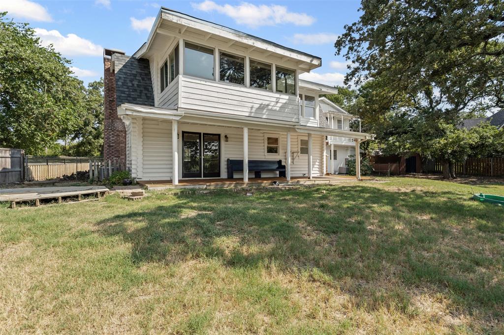 7329 Hickey Road Azle, TX 76020 - Photo 22 of 28 a view of a house with a backyard