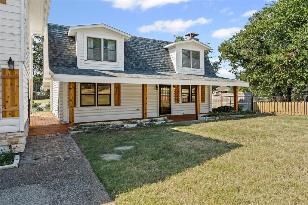 7329 Hickey Road Azle, TX 76020 - Photo 10 of 28 a front view of a house with a yard