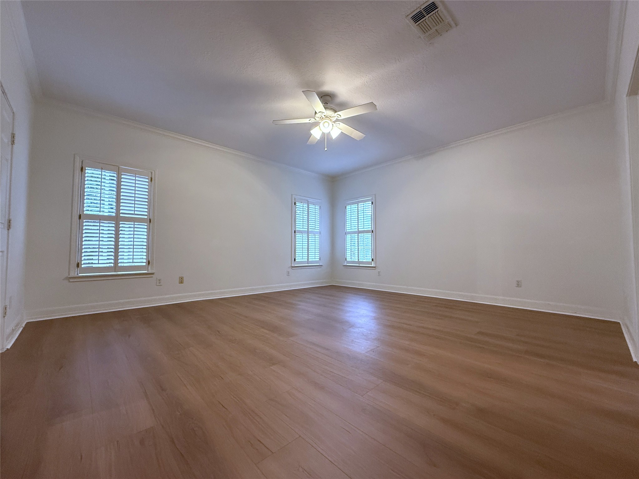 3024 Rice Boulevard Houston, TX 77005 - Photo 16 of 38 On the second story and immediately at the top of the stairs is the spacious primary bedroom.