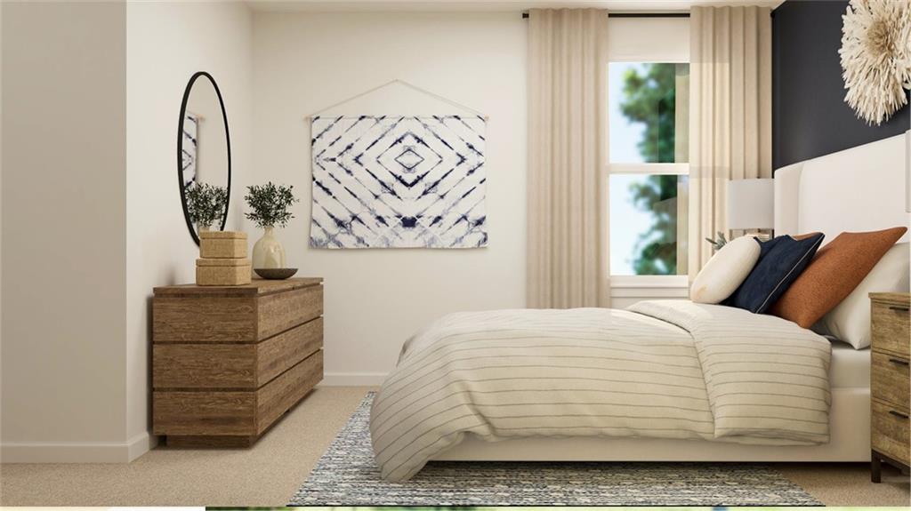 116 Beautiful Way Locust Grove, GA 30248 - Photo 14 of 35 a bedroom with a bed and a mirror