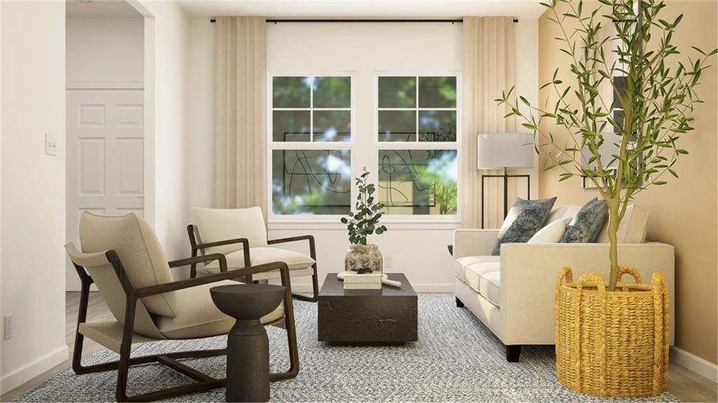 116 Beautiful Way Locust Grove, GA 30248 - Photo 22 of 35 a living room with furniture and a window