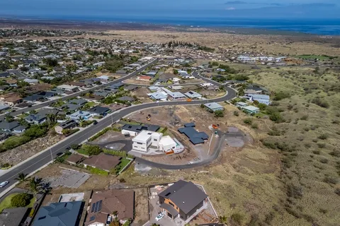 a view of a city with ocean view