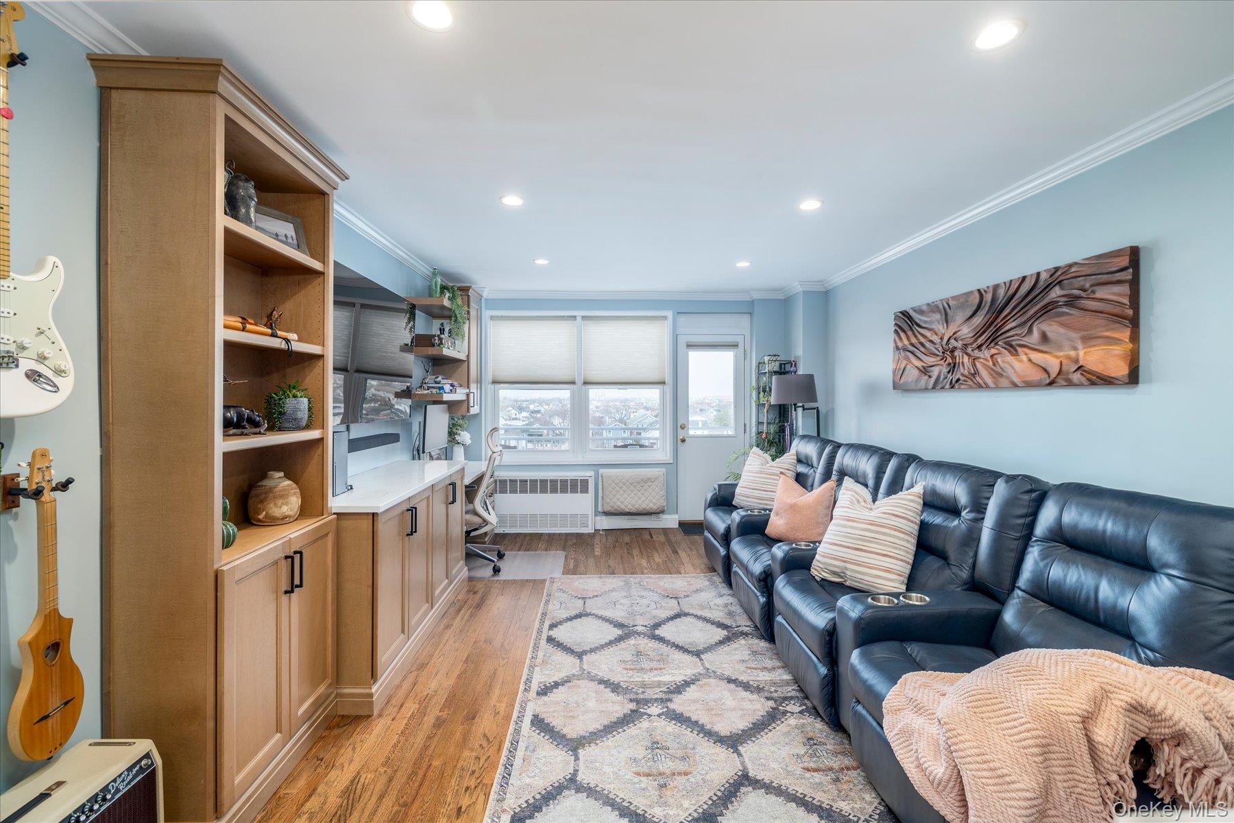 522 Shore Road, Unit 5T Long Beach, NY 11561 - Photo 3 of 22 Living room with built in entertainment center and storage