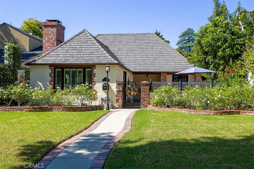 847 Victoria Drive Pasadena, CA 91104 - Photo 1 of 21 a front view of a house with a yard