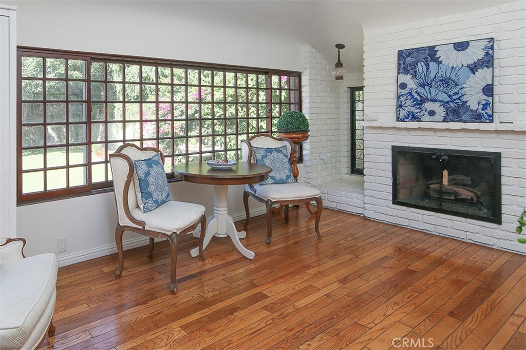 847 Victoria Drive Pasadena, CA 91104 - Photo 12 of 21 a living room with furniture and a fireplace