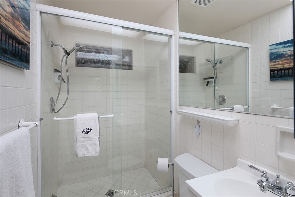 847 Victoria Drive Pasadena, CA 91104 - Photo 16 of 21 a bathroom with a shower and a sink