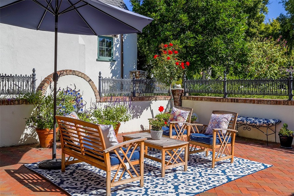 847 Victoria Drive Pasadena, CA 91104 - Photo 3 of 21 a table and chairs in the patio