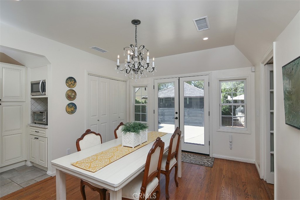 847 Victoria Drive Pasadena, CA 91104 - Photo 10 of 21 a view of a dining room with furniture and chandelier
