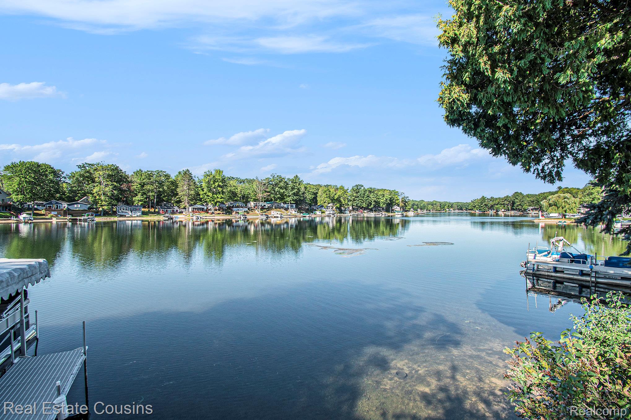 1734 Forest Road Harrison, MI 48625 - Photo 26 of 31 Water view featuring a boat dock