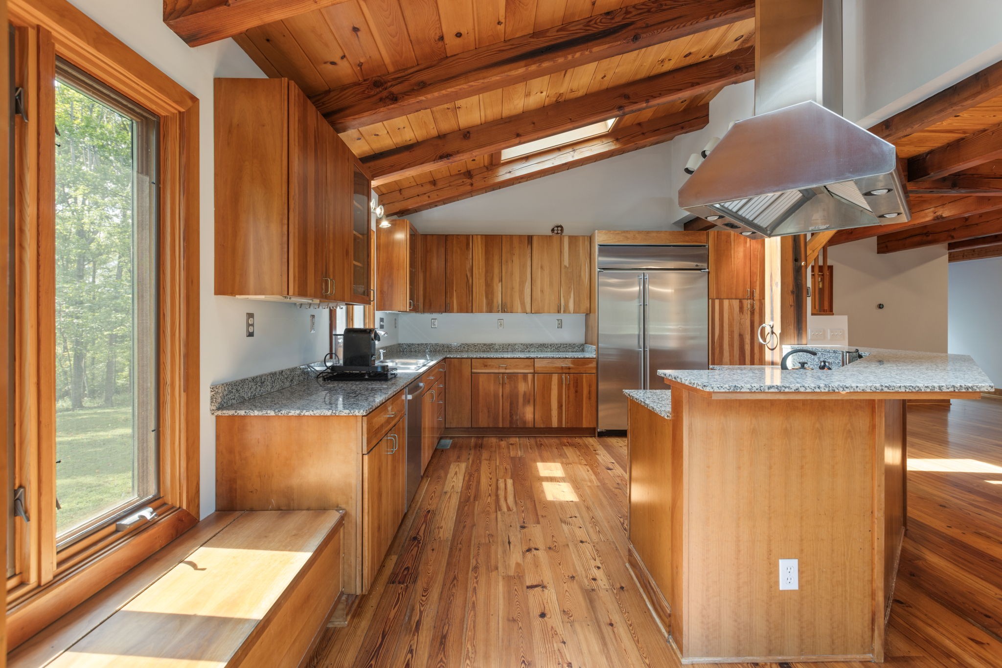 7725 Caney Fork Road Fairview, TN 37062 - Photo 11 of 58 a kitchen with stainless steel appliances granite countertop a stove a sink and a refrigerator