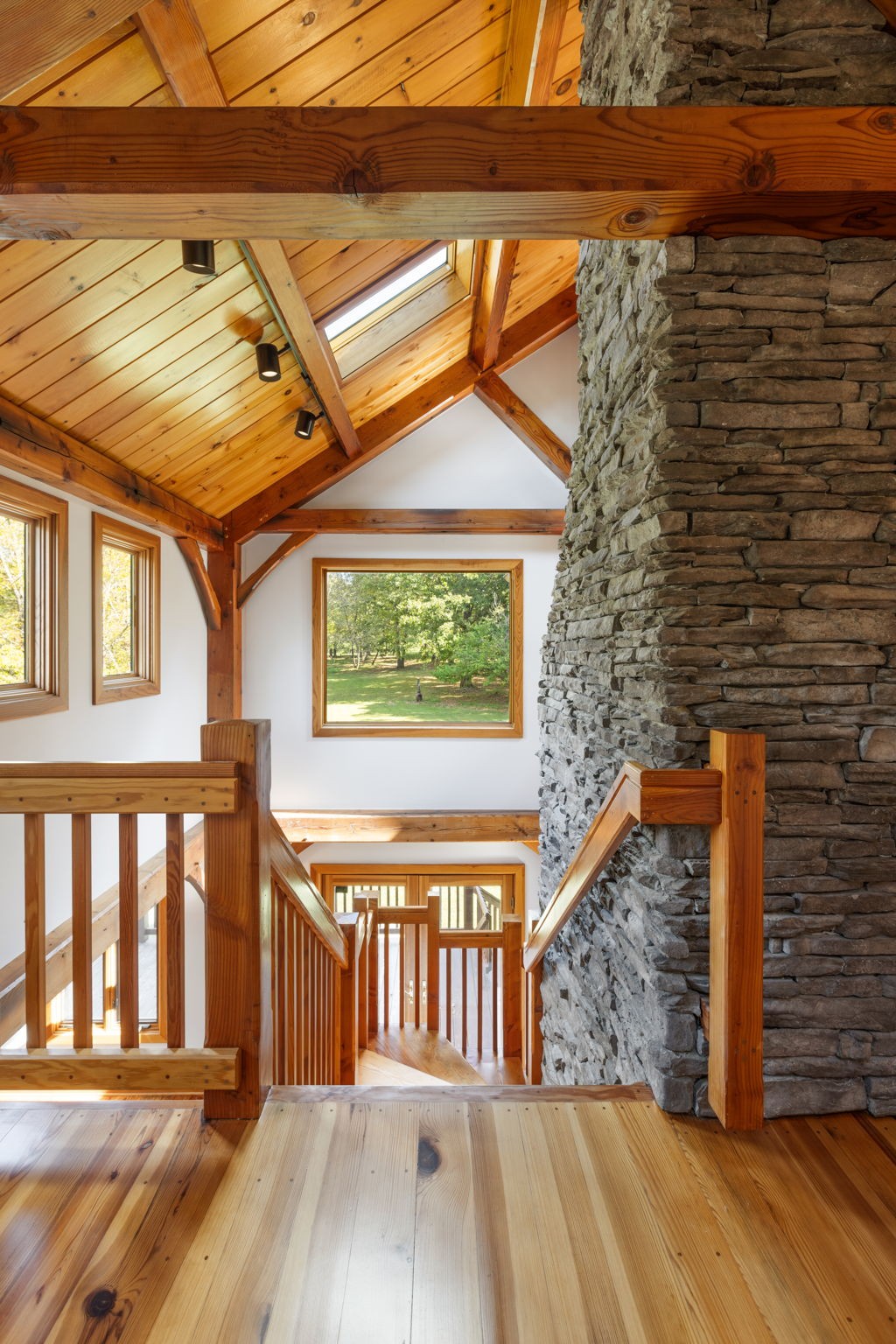 7725 Caney Fork Road Fairview, TN 37062 - Photo 22 of 58 a view of a brick house with a balcony
