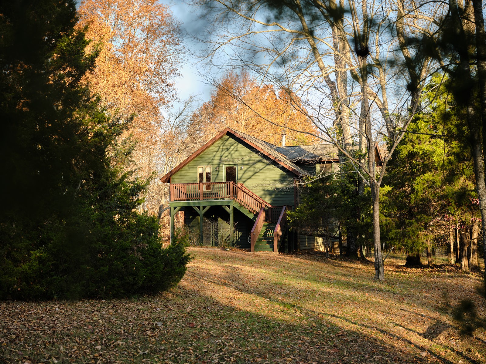 7725 Caney Fork Road Fairview, TN 37062 - Photo 34 of 58 a view of a house with a yard