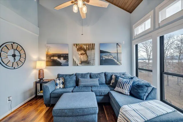 a bedroom with a bed and a lamp