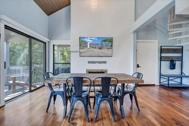 a kitchen with granite countertop a refrigerator and a sink