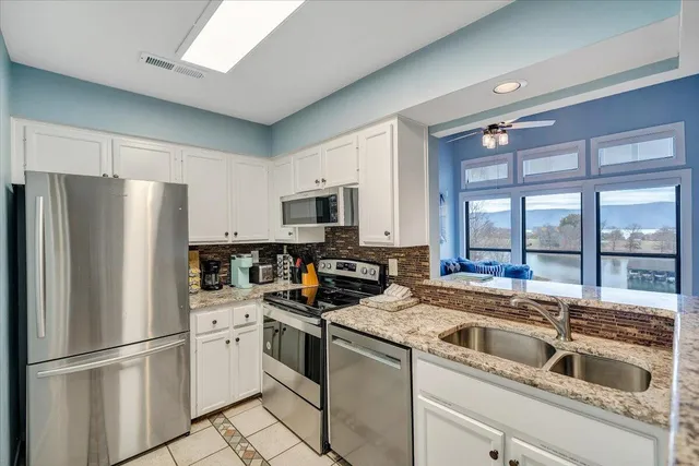 a view of a backyard of a house