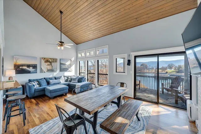 a living room with couch and a window