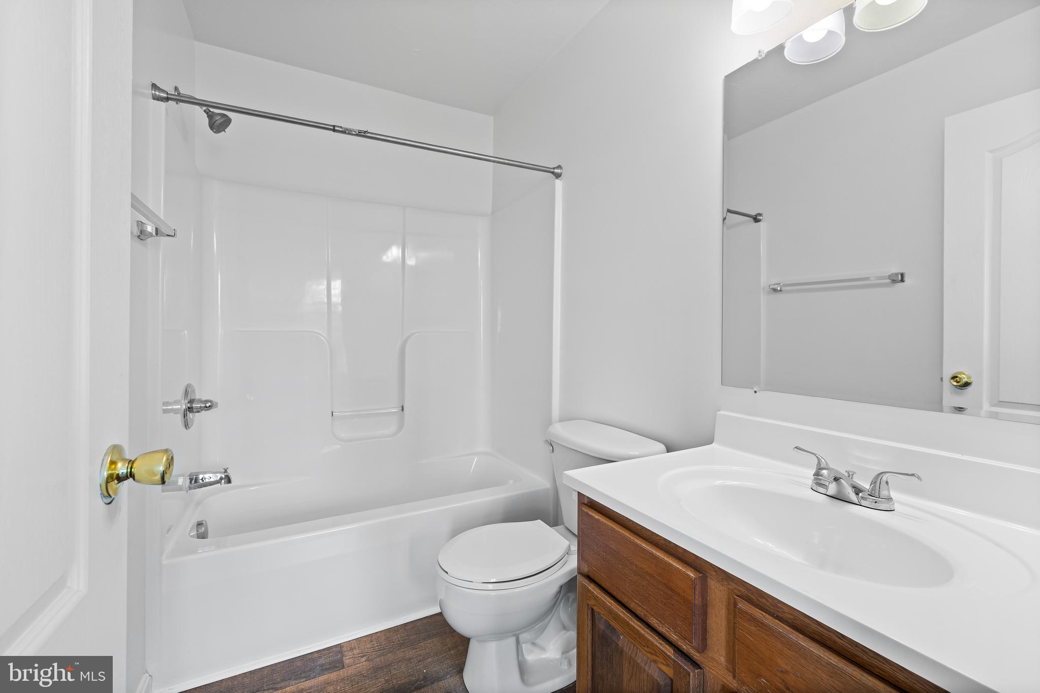 8 Shady Tree Court York, PA 17402 - Photo 17 of 23 a bathroom with a granite countertop sink toilet and shower