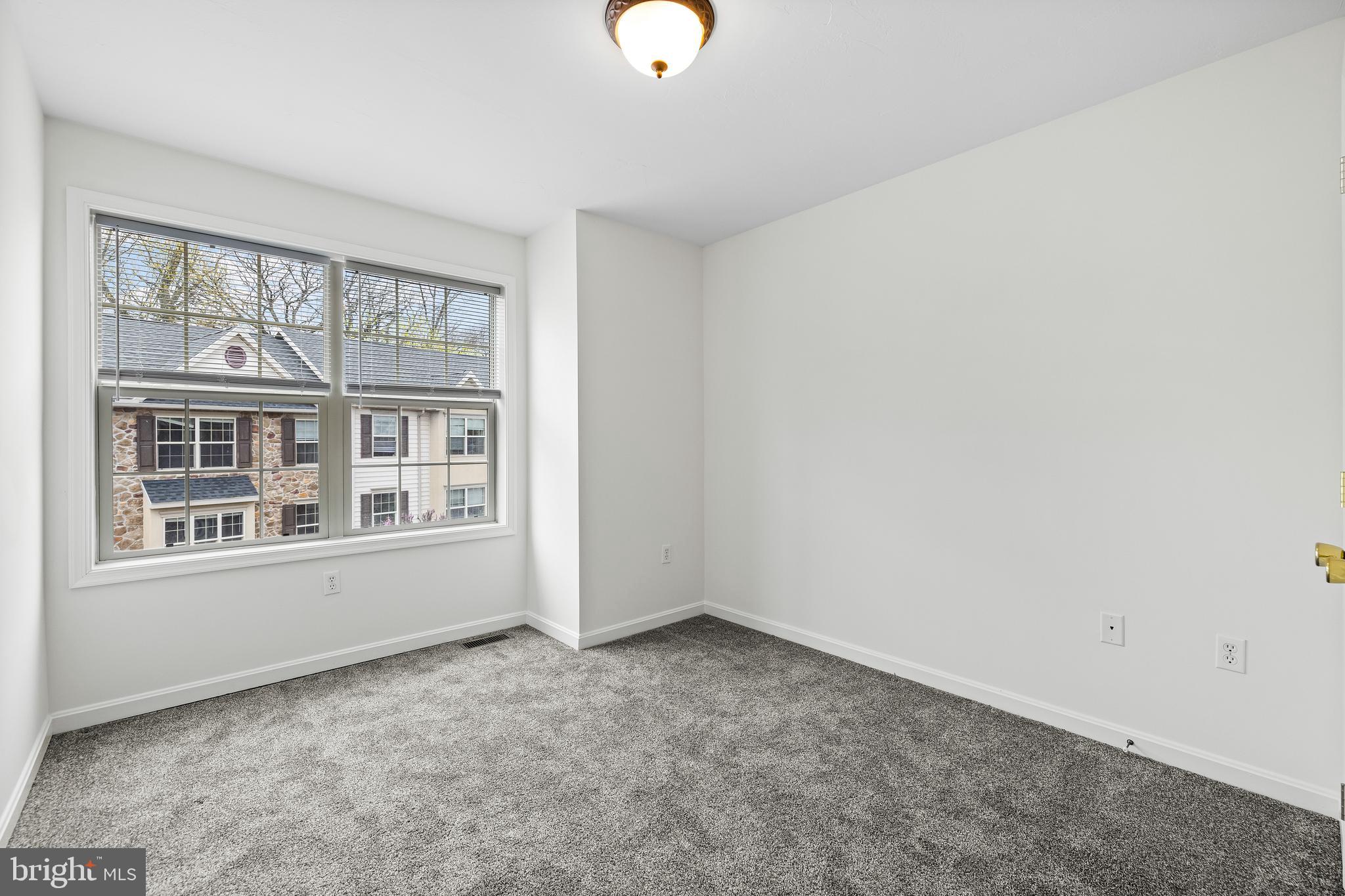 8 Shady Tree Court York, PA 17402 - Photo 18 of 23 an empty room with windows