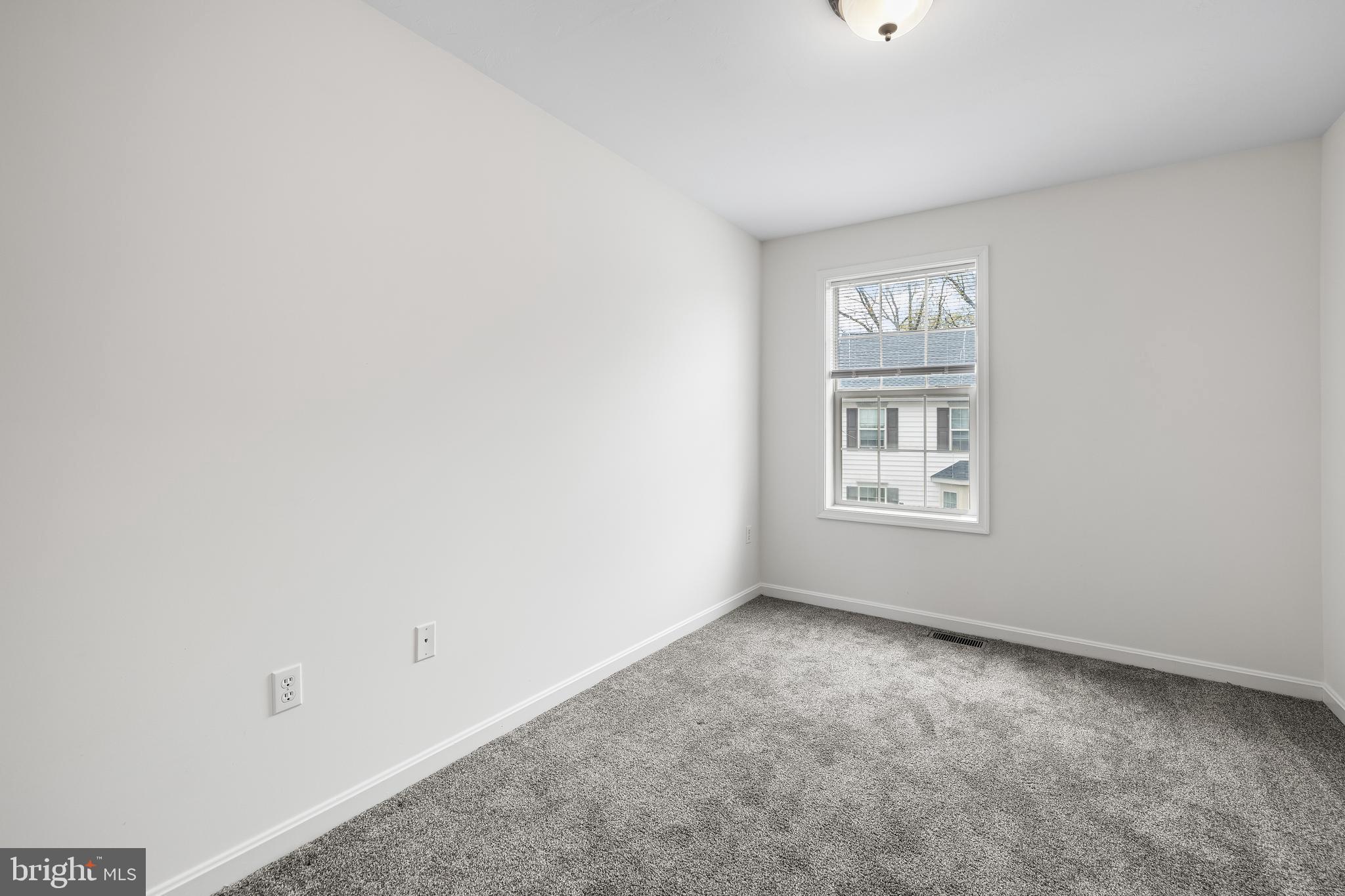 8 Shady Tree Court York, PA 17402 - Photo 20 of 23 a view of an empty room with a window