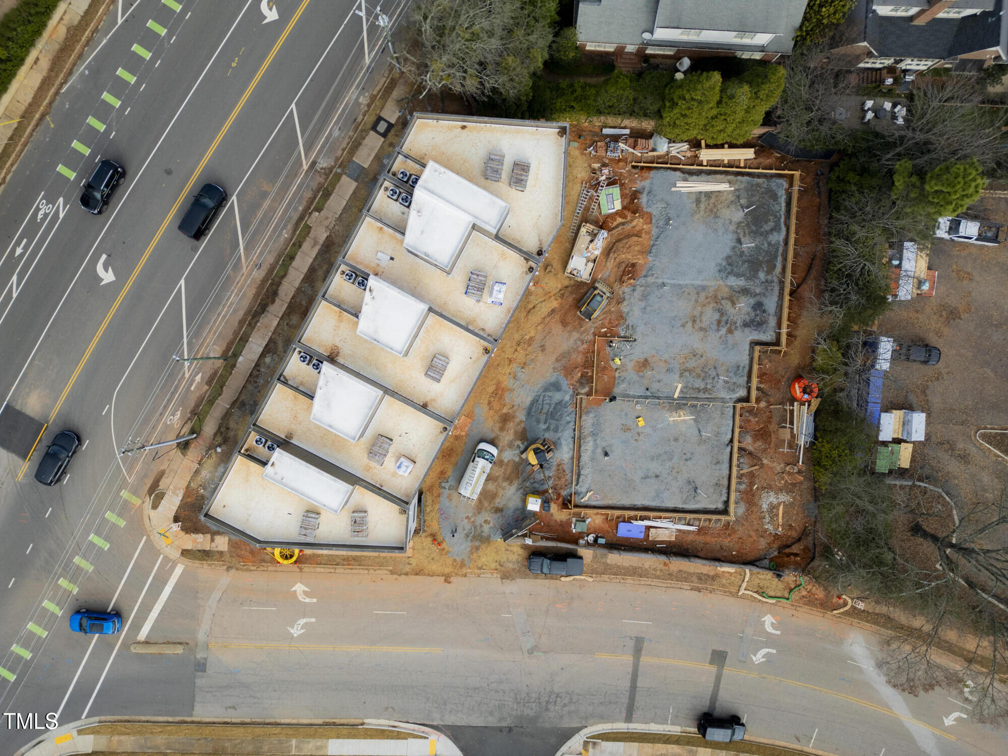1310 Chamblee Hill Raleigh, NC 27608 - Photo 13 of 26 an aerial view of residential house with parking