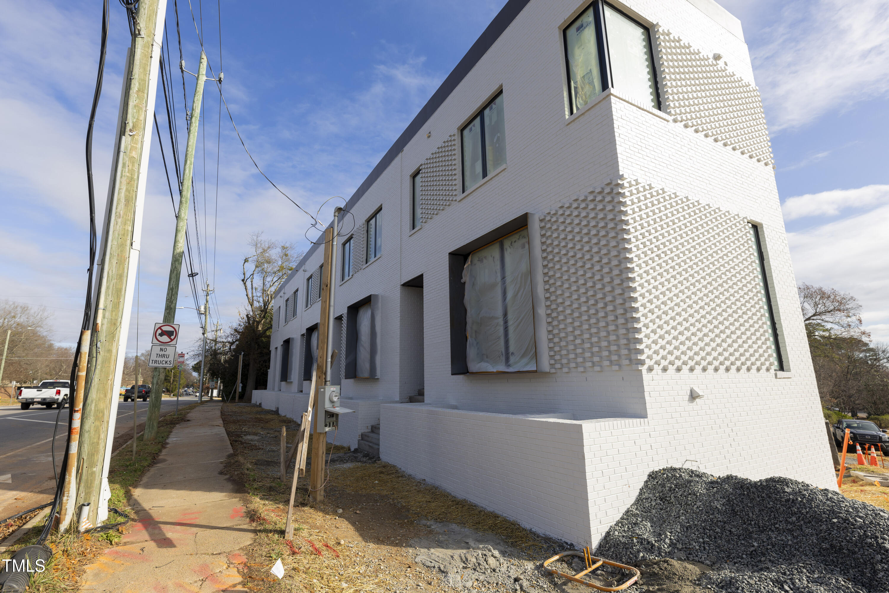 1310 Chamblee Hill Raleigh, NC 27608 - Photo 16 of 26 a view of living room kitchen and entryway