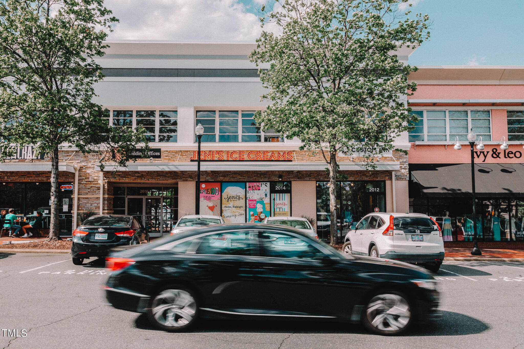 1310 Chamblee Hill Raleigh, NC 27608 - Photo 26 of 26 a car parked in front of a building