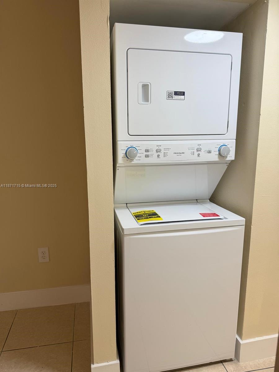2377 West 66th Place, Unit 204 Hialeah, FL 33016 - Photo 17 of 17 a view of washer and dryer