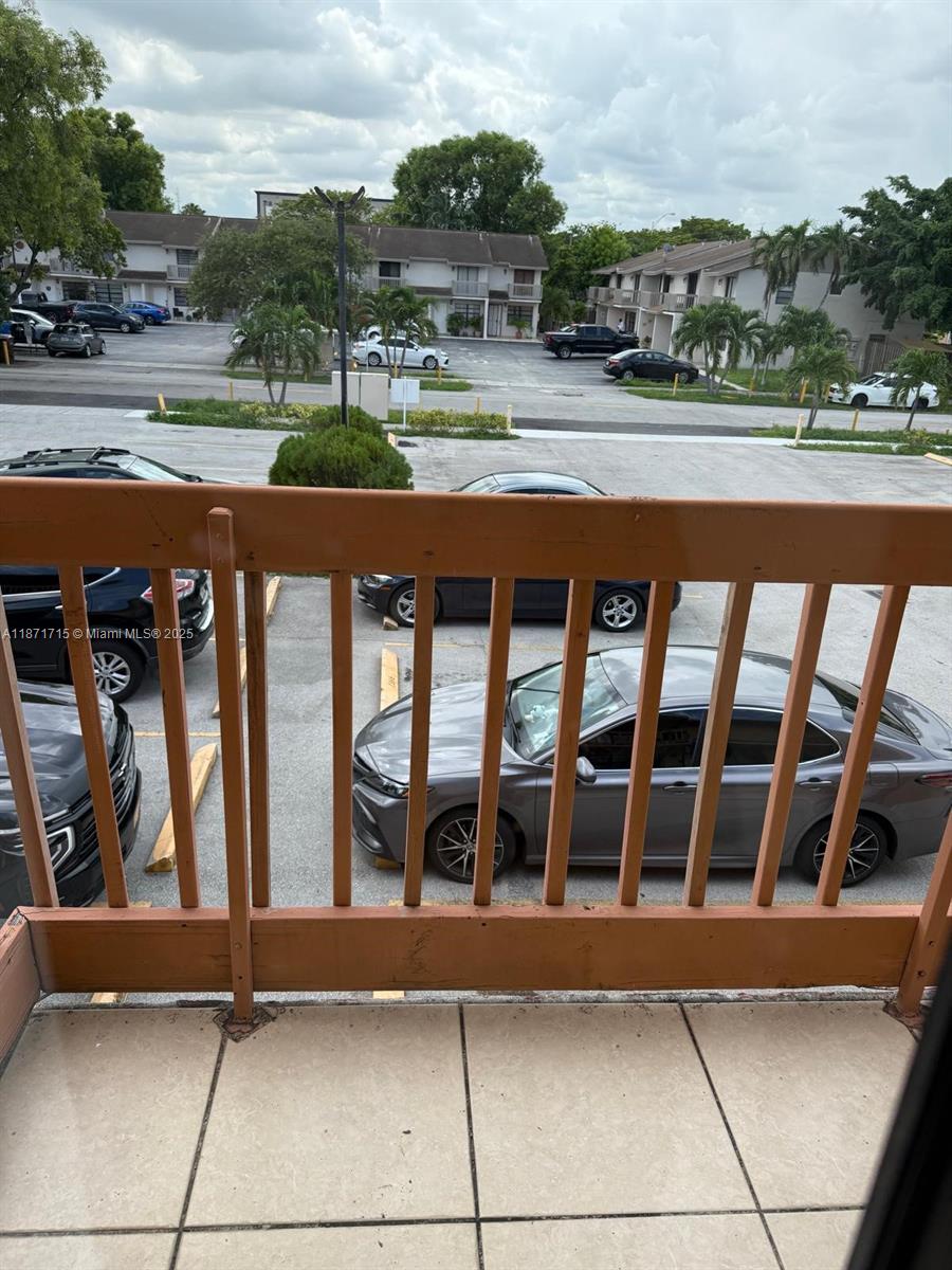 2377 West 66th Place, Unit 204 Hialeah, FL 33016 - Photo 3 of 17 a view of swimming pool with outdoor space and seating area