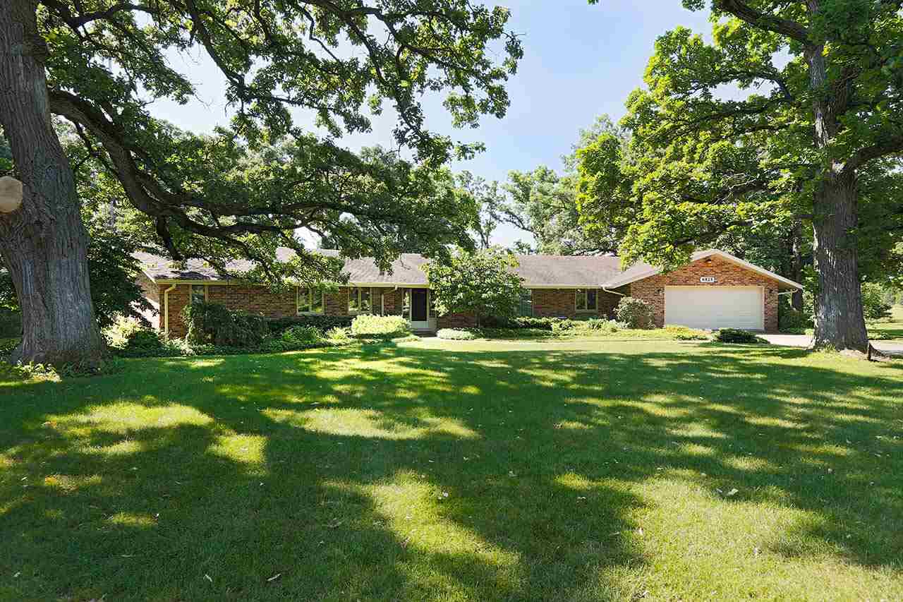 6825 Middle Road South Beloit, IL 61080 - Photo 1 of 23 a view of a house with a yard