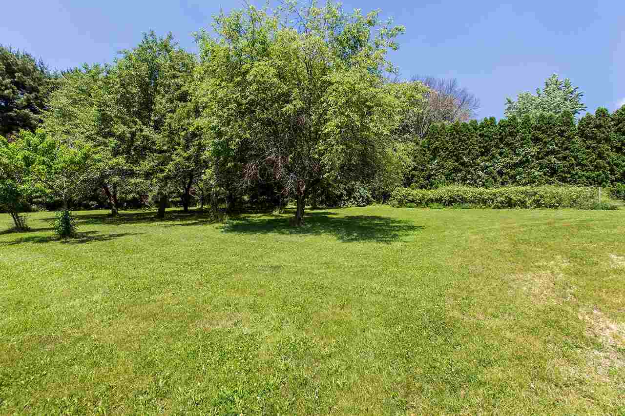 6825 Middle Road South Beloit, IL 61080 - Photo 21 of 23 a view of outdoor space with deck and yard