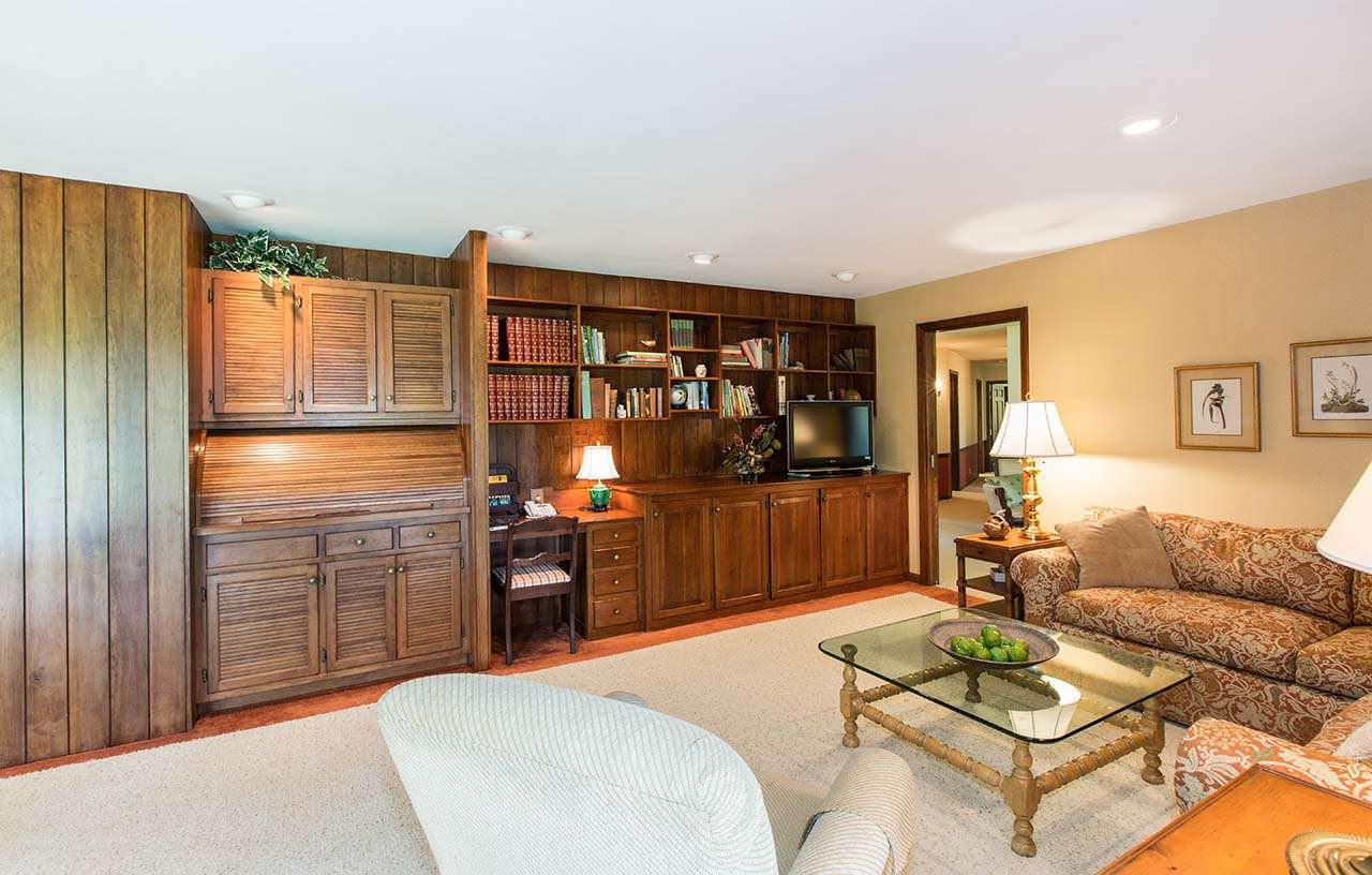 6825 Middle Road South Beloit, IL 61080 - Photo 7 of 23 a living room with furniture a rug and kitchen view