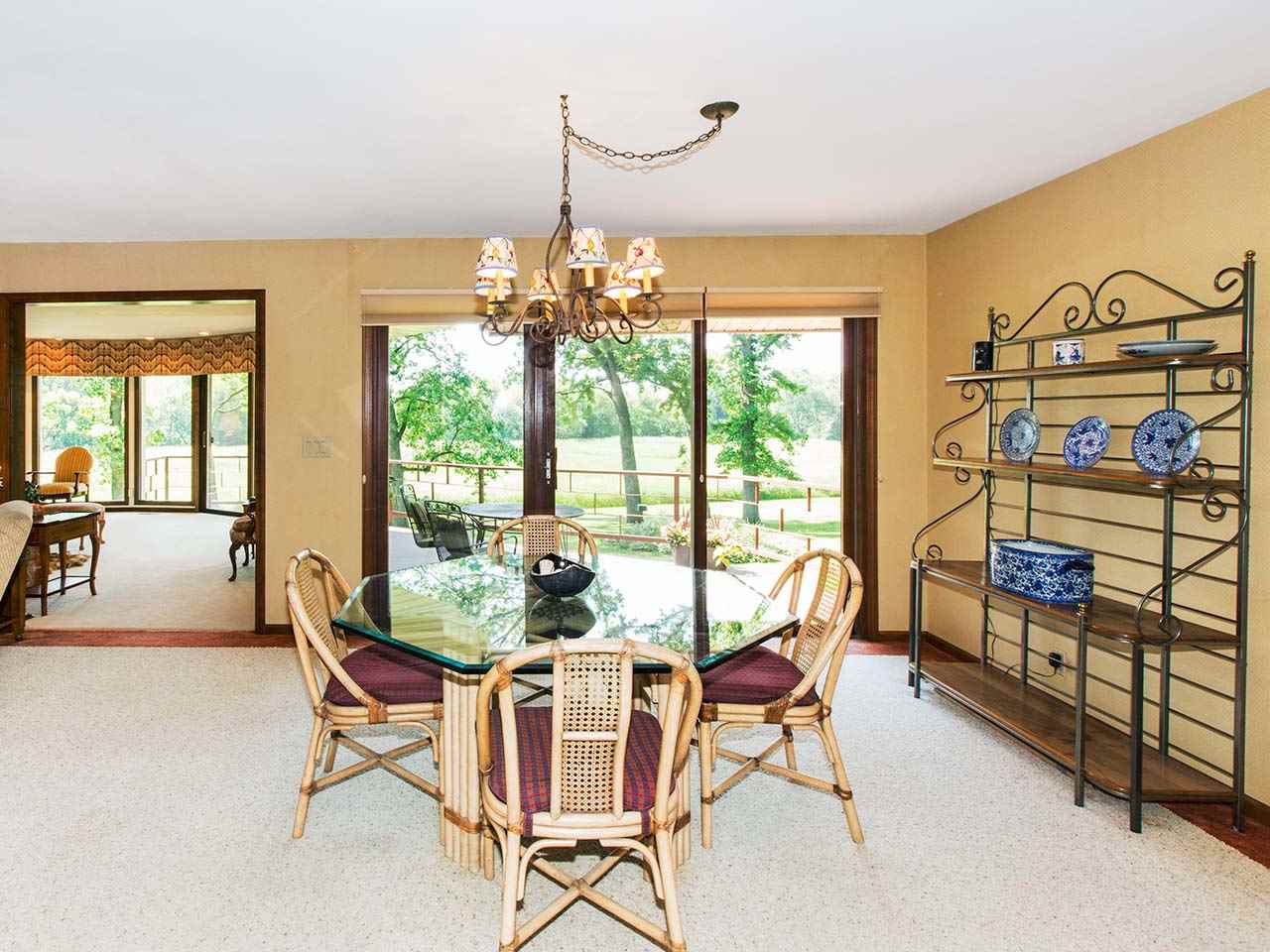 6825 Middle Road South Beloit, IL 61080 - Photo 10 of 23 a dining room with furniture and chandelier kitchen view