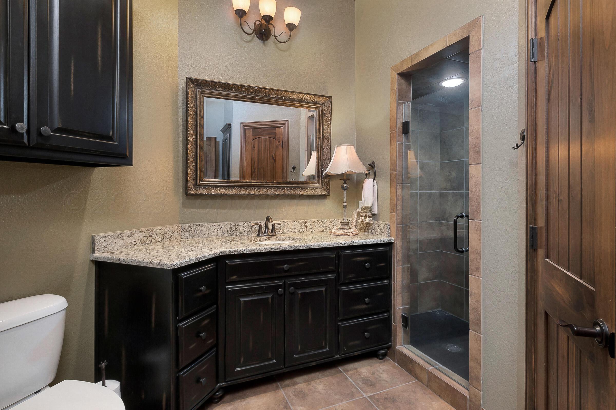 7801 East Lake View Road Amarillo, TX 79118 - Photo 35 of 54 Downstairs Bath