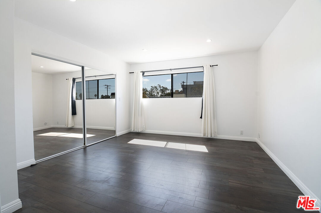 853 Le Doux Road, Unit 201 Los Angeles, CA 90035 - Photo 28 of 36 a view of a livingroom with wooden floor