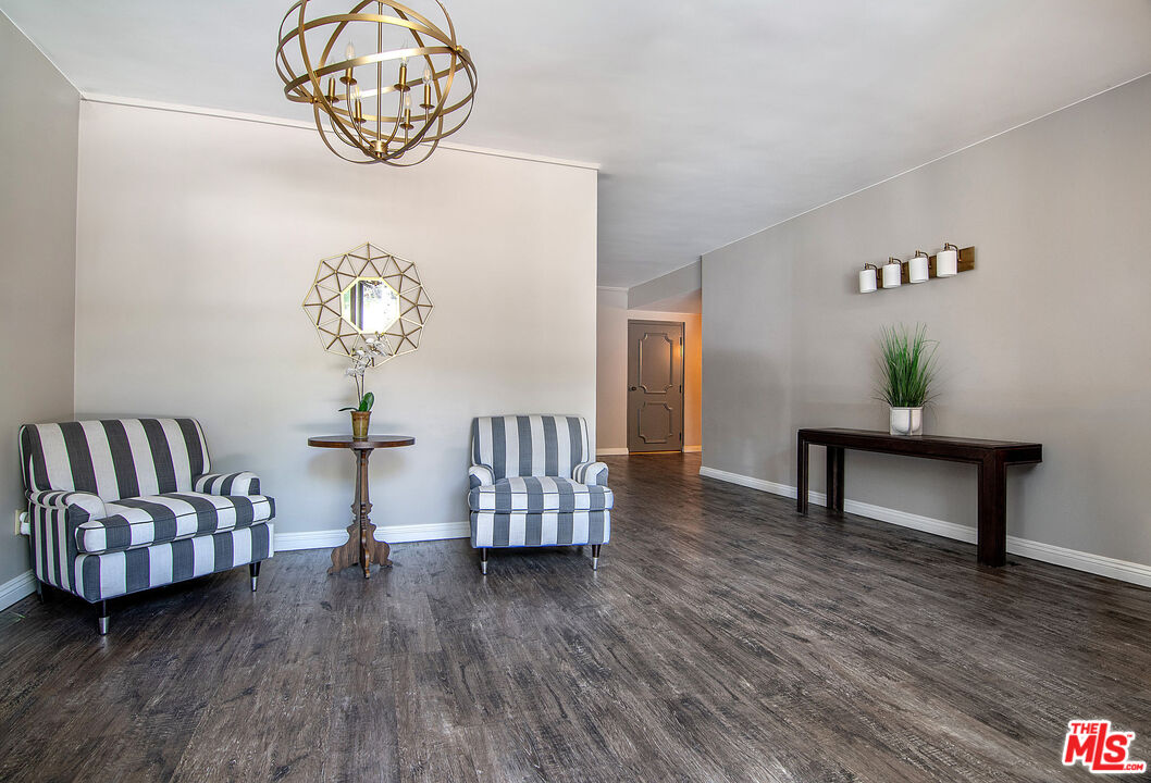853 Le Doux Road, Unit 201 Los Angeles, CA 90035 - Photo 35 of 36 a view of dining room with furniture and wooden floor