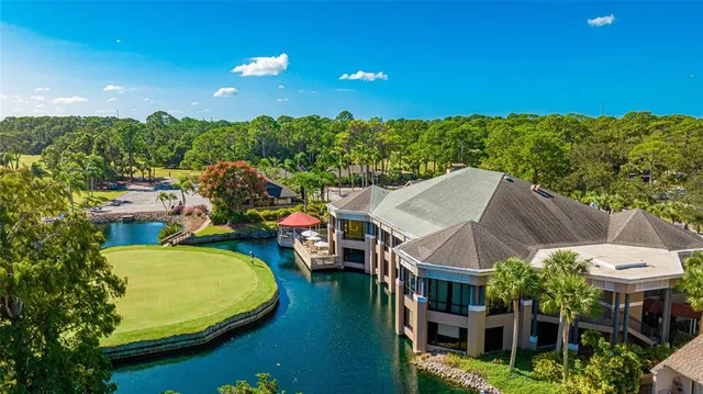 a view of a swimming pool and lounge chair