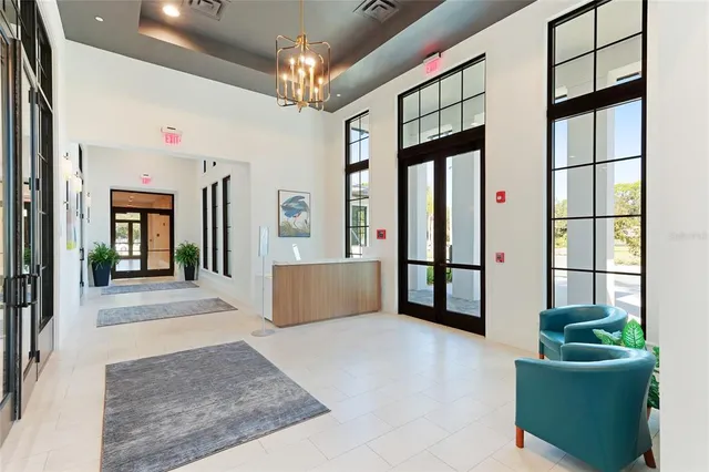 a view of a livingroom with furniture and window