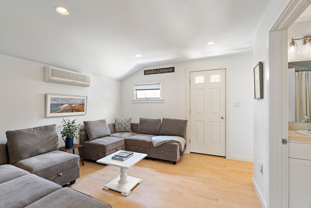 13 Young Street Edgartown, MA 02539 - Photo 8 of 29 a living room with furniture and a couch