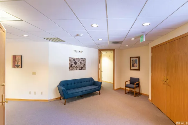 a view of livingroom with furniture and a couch