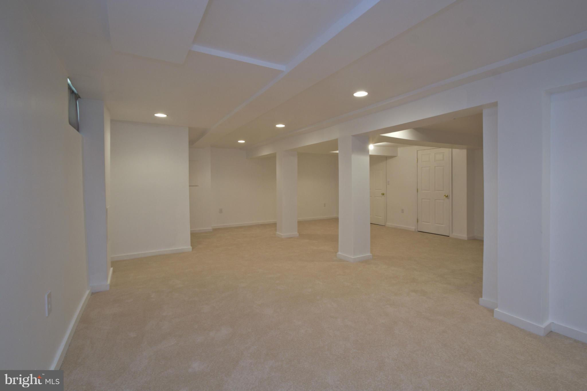 409 South Wickham Road Baltimore, MD 21229 - Photo 21 of 30 Brand New Lower Level Family Room