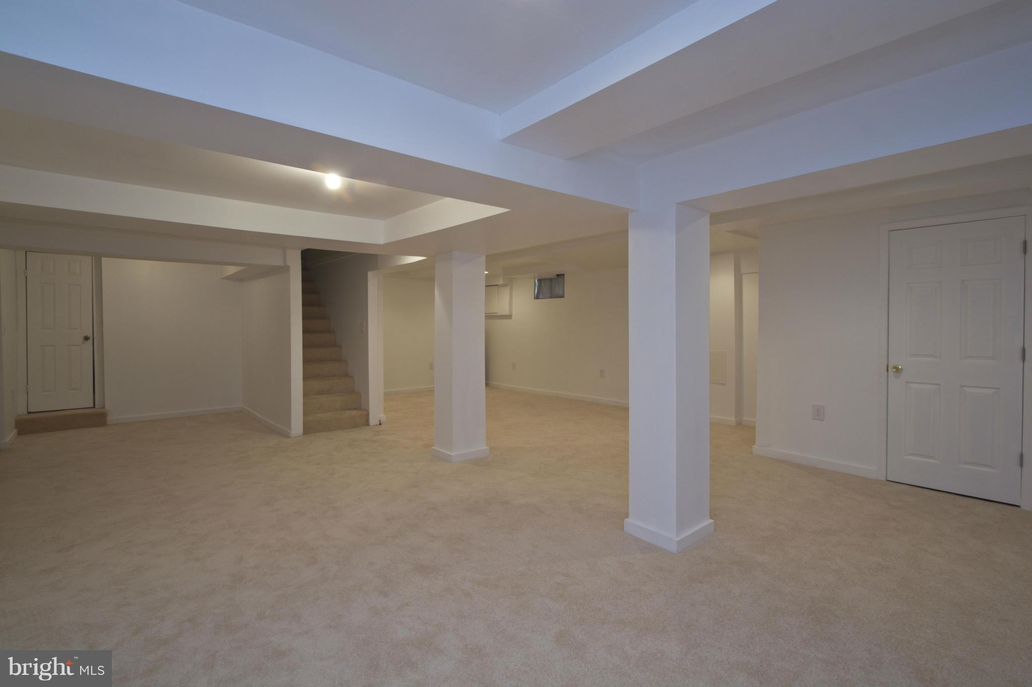 409 South Wickham Road Baltimore, MD 21229 - Photo 23 of 30 Brand New Lower Level Family Room