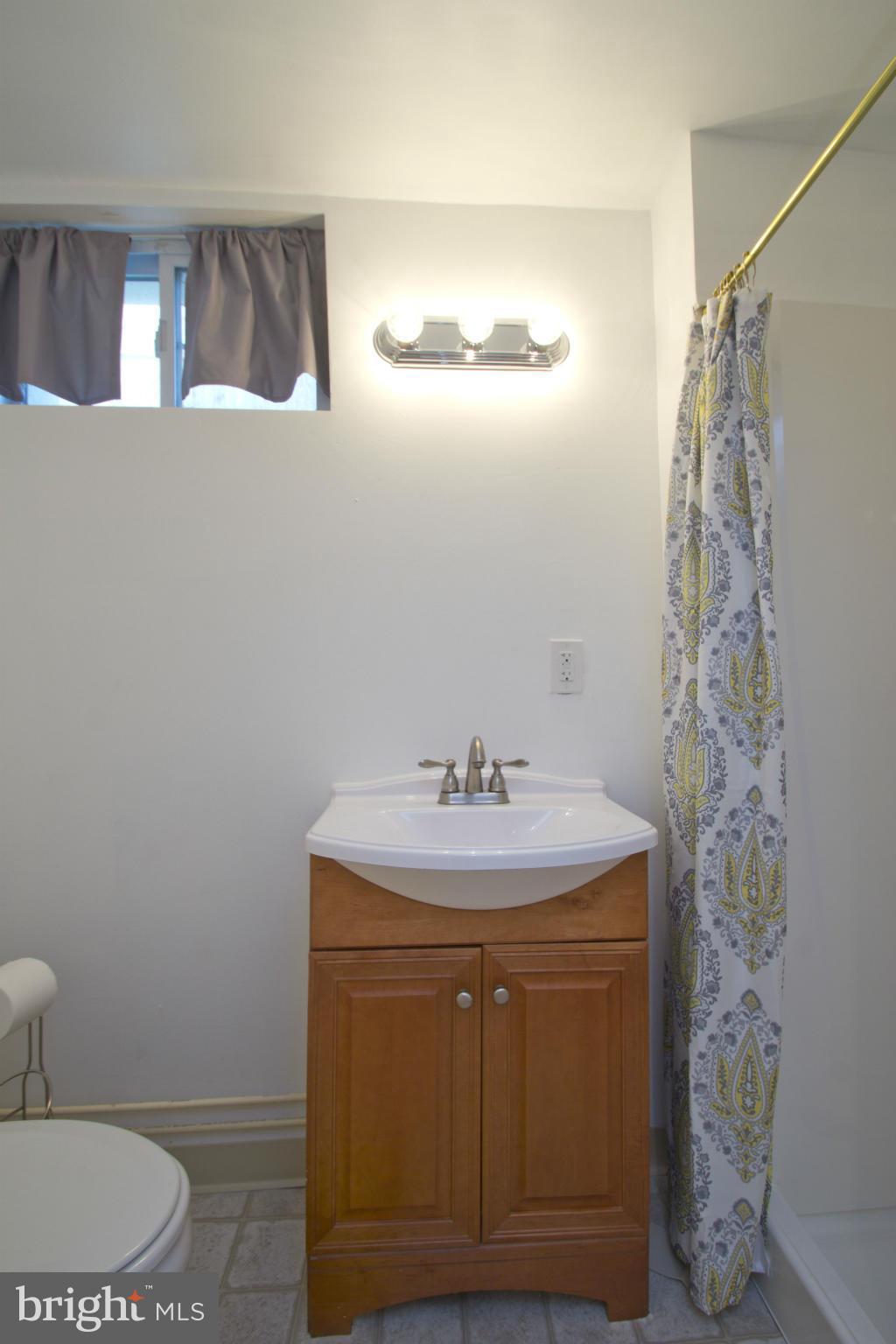 409 South Wickham Road Baltimore, MD 21229 - Photo 24 of 30 Second Full Bathroom with Shower in Lower Level