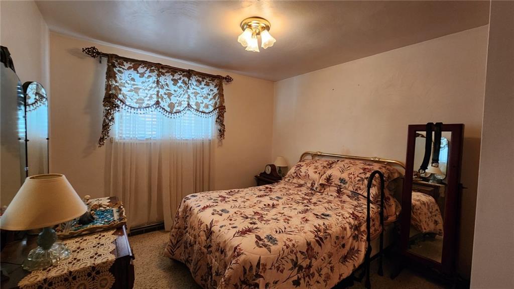 262 Vista Drive Apollo, PA 15613 - Photo 16 of 23 a bed sitting in a bedroom next to a window