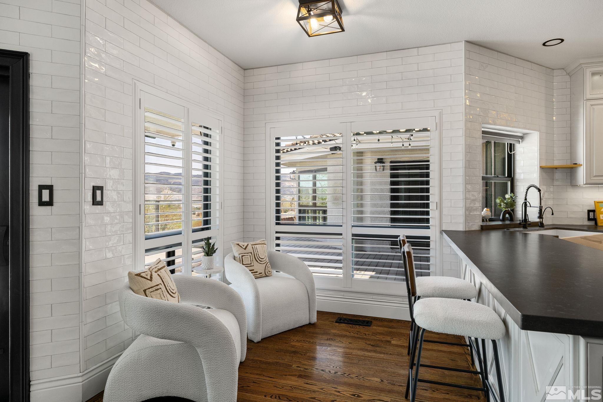 12595 Water Lily Way Reno, NV 89511 - Photo 12 of 36 a bedroom with furniture and a large window